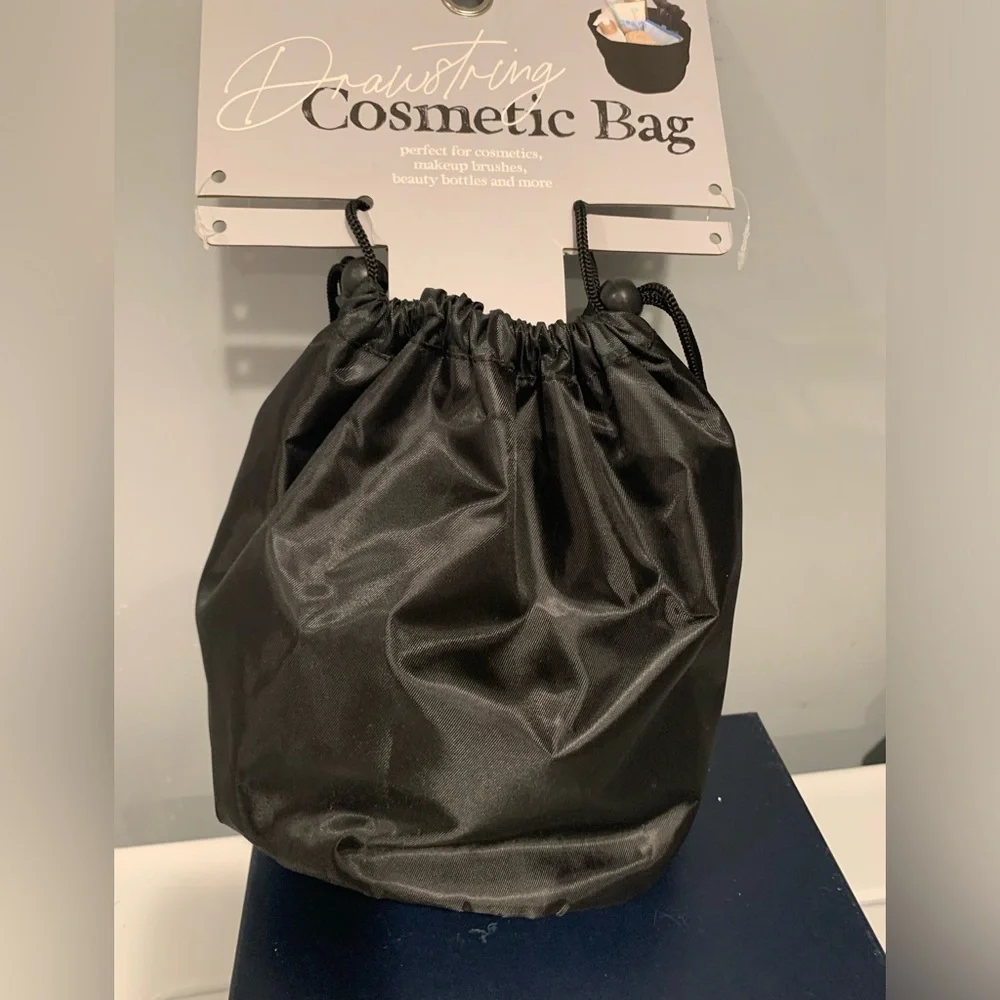 NWT Bella beauty black drawstring cosmetic bag.Perfect gift!